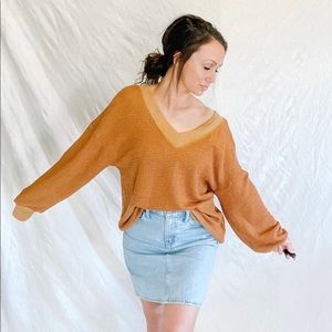 SOLD Listicle rust lightweight knit, has V neck+back.
Size S,